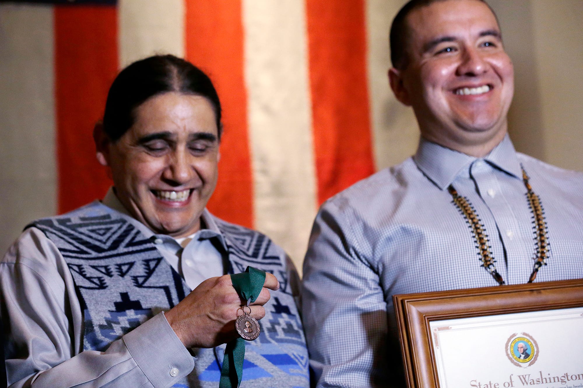 Tobin and Willie Frank accepting an award