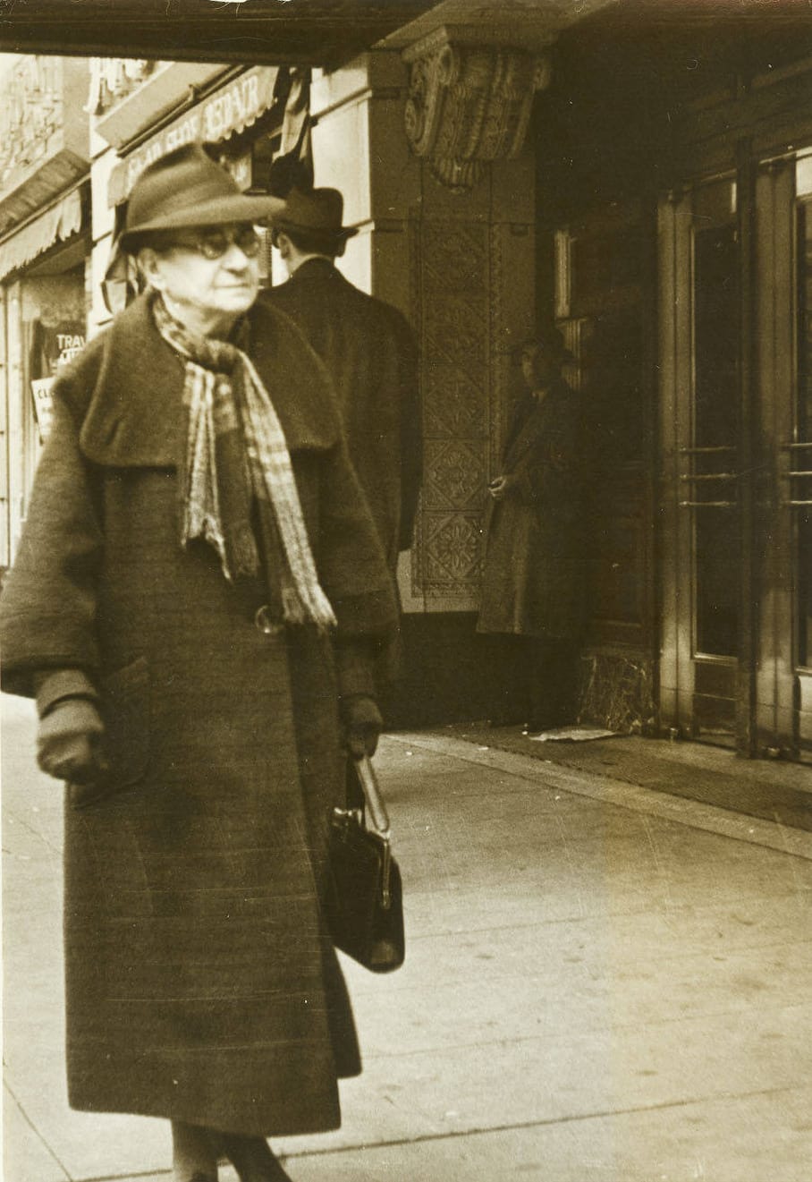 Alice Lord walks a Seattle street, circa 1935.
