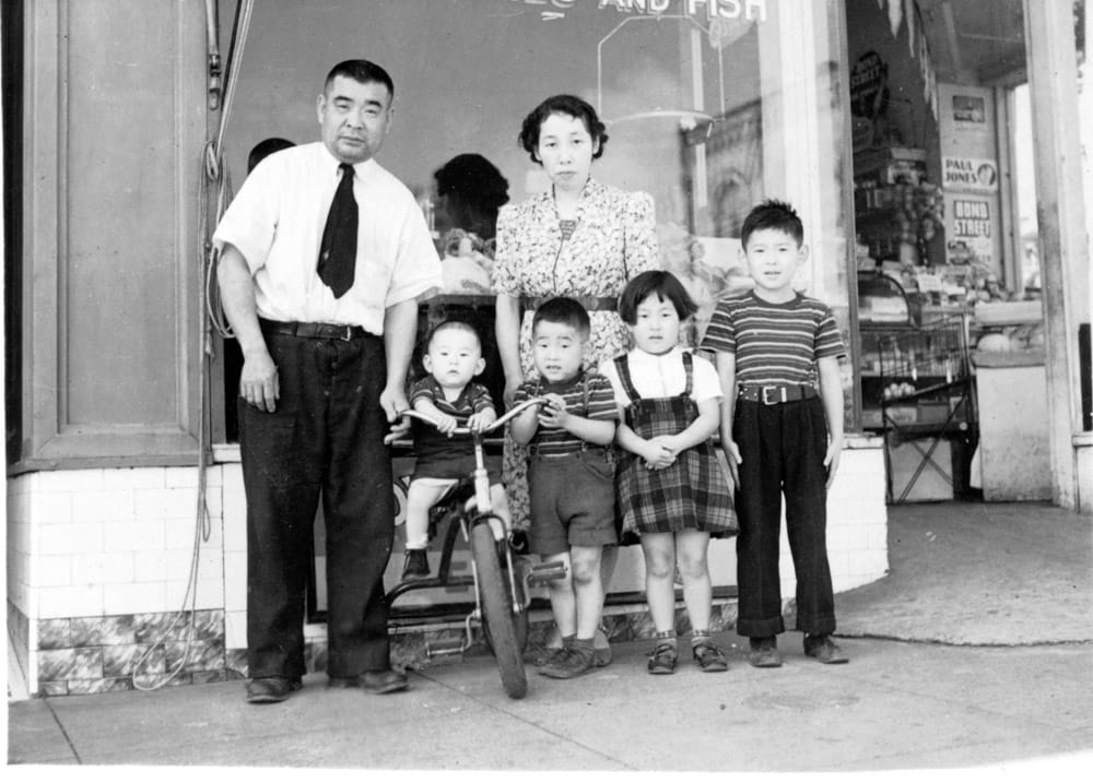 The Moriguchi family outside their store.