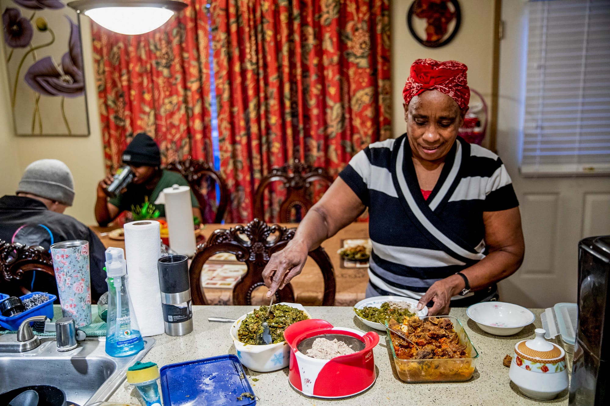 Veronica prepares dinner in her kitchen