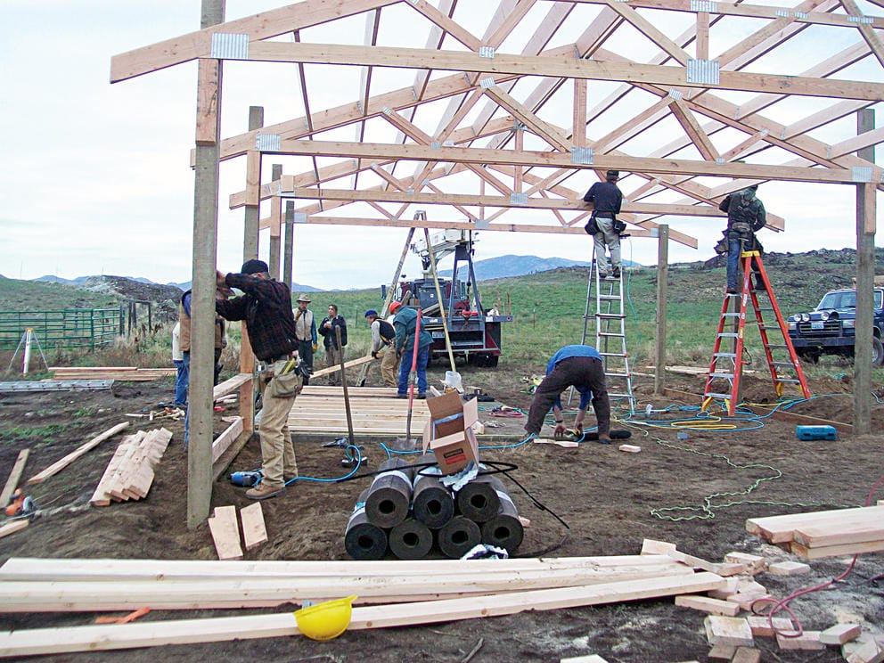 Workers building a frame