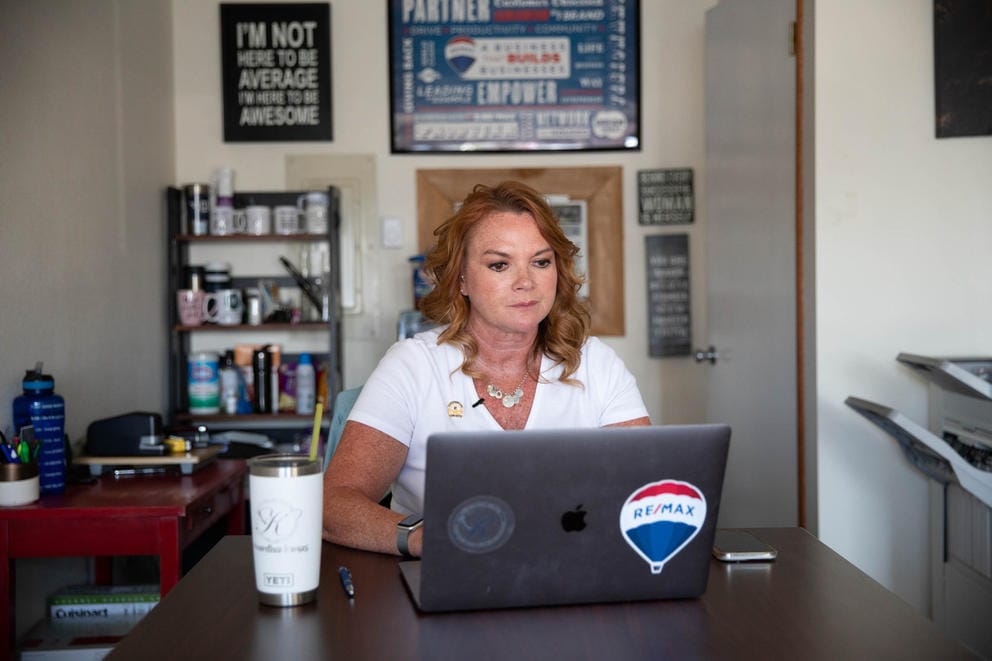 Real estate broker Kitty Wallace works in her Cle Elum office