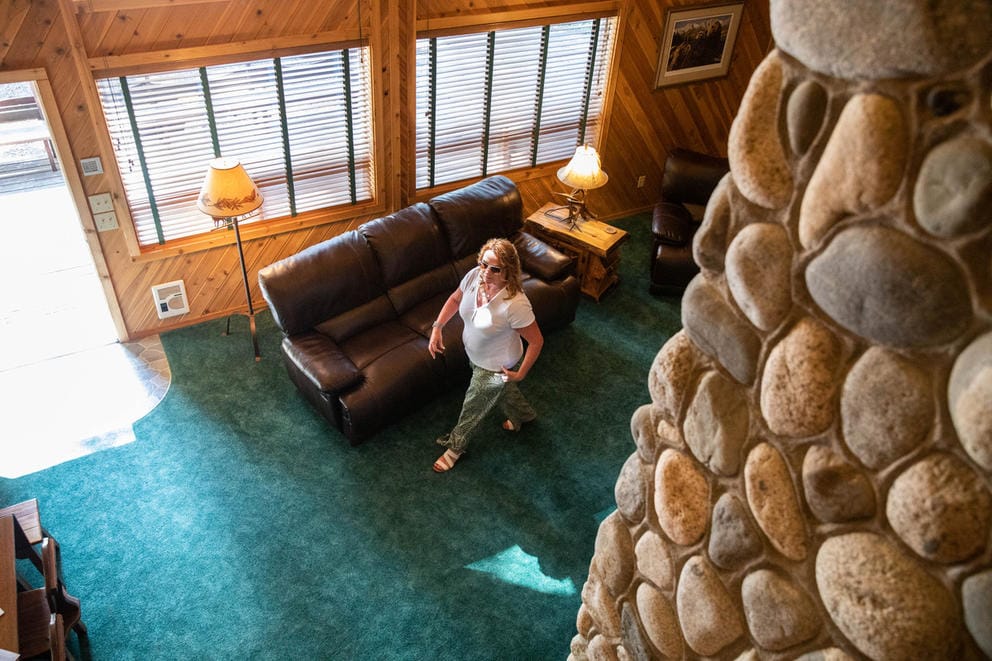 Real estate broker prepares home for sale near Ronald, Washington