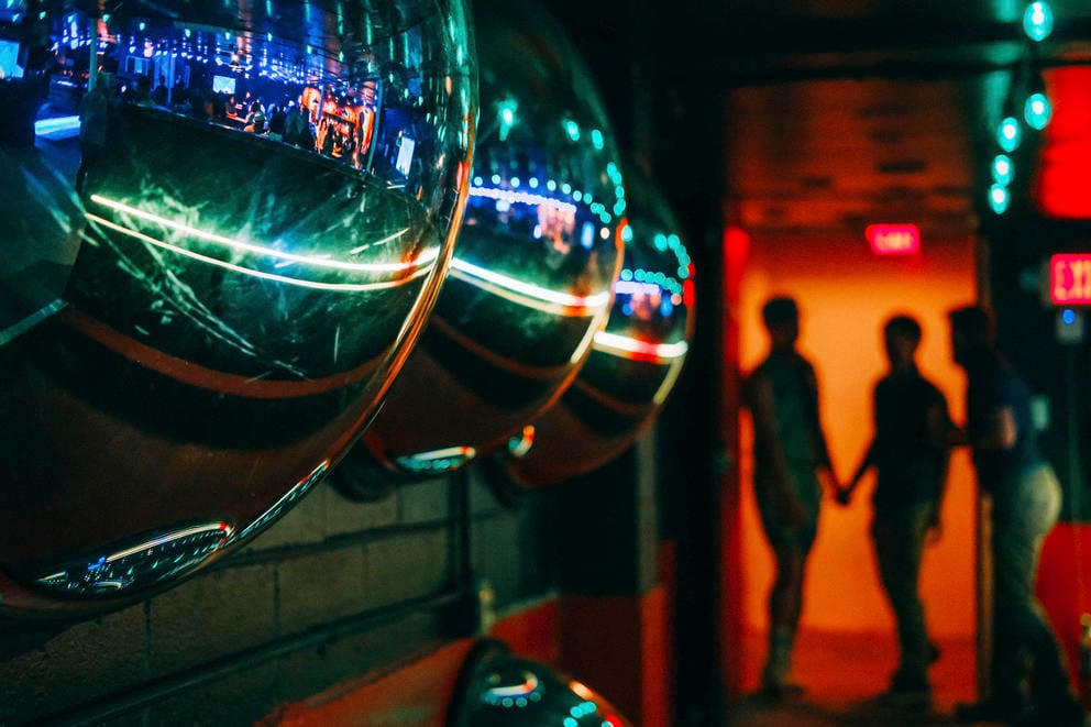 The bar is reflected in convex mirrors