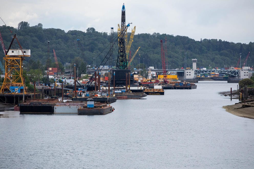 cranes and industrial buildings along the duwamish river