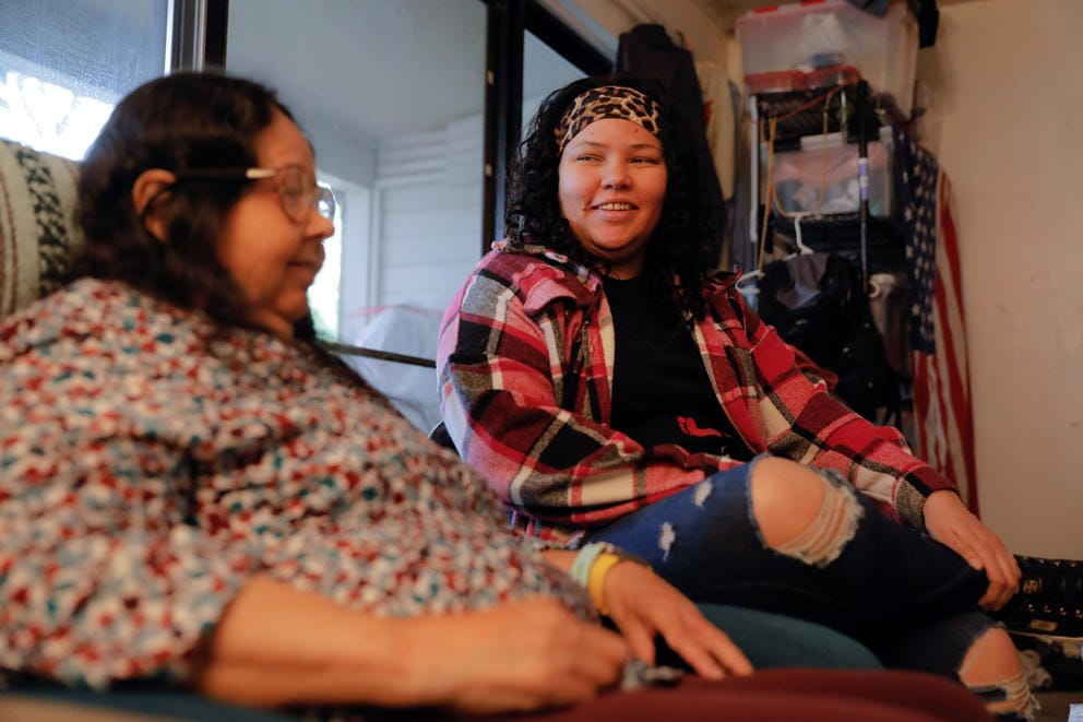 Debra Braxton sits at left while chatting with her daughter Janell.