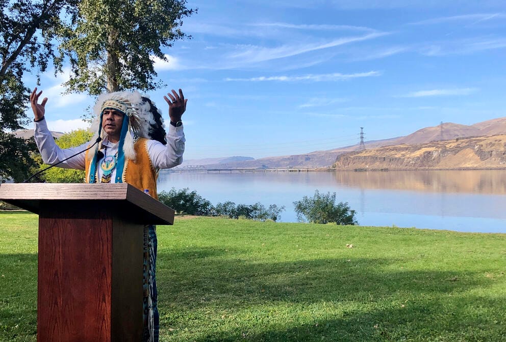 JoDe Goudy, chairman of the Yakama Nation, speaks with the Columbia River in the background
